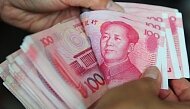 Шок от Brexit может усилить интернационализацию юаня